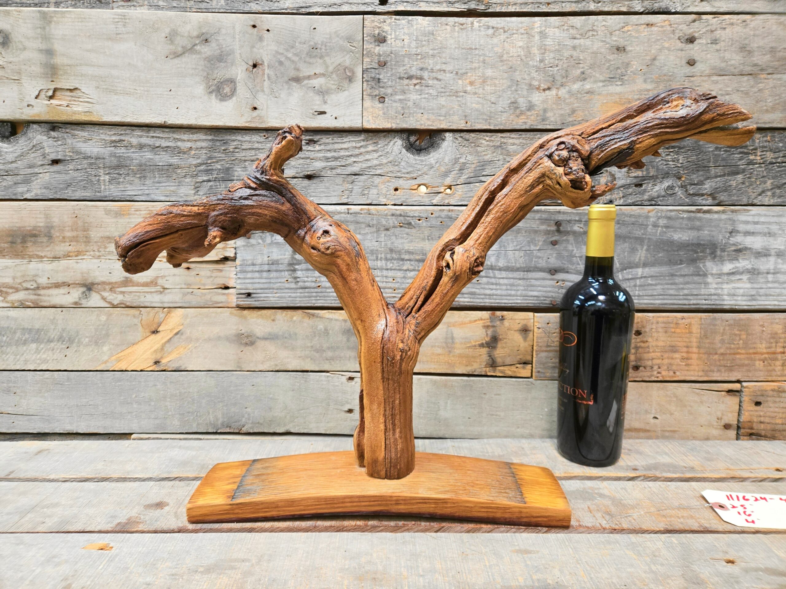 J. Lohr Cabernet grapevine sculpture 111624-46 on a reclaimed wine-barrel stave base
