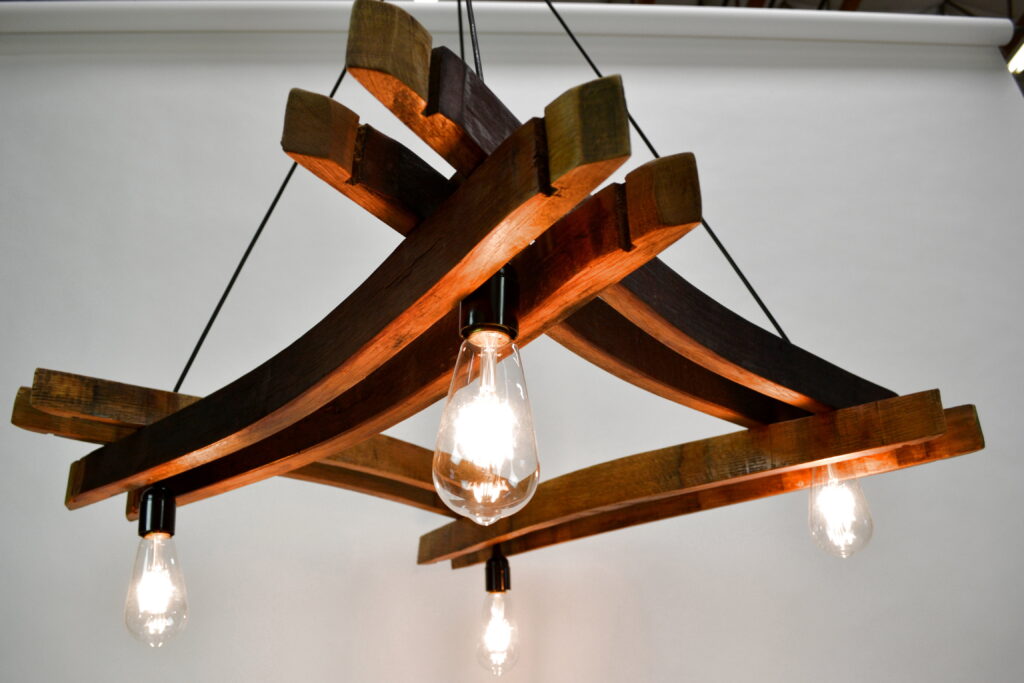 Artessa chandelier handcrafted from reclaimed wine-barrel staves with four lights